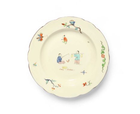 A Chantilly style plate, 19th century, painted in Kakiemon enamels with Chinese boys fishing and at other pursuits, the rim w