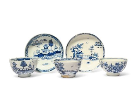 Two Lowestoft blue and white teabowls and saucers, c.1765-75, painted with Chinese pagodas in island landscapes, and a third 
