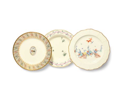 Three Derby plates or dishes, c.1780-1800, one with an armorial shield to the well, the rim with a Sèvres-style border of dia