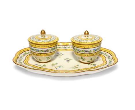 A Sèvres preserve stand (plateau à deux pots de confiture), date code for 1788, painted with scattered convolvulus flowers an