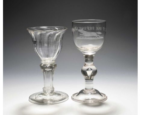 A sweetmeat glass, c.1740, the bowl moulded with spiral flutes, raised on a pedestal stem with annulated rings over a folded 