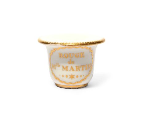 A Sèvres rouge pot, c.1770-80, one side decoration with a gilt inscription reading 'Rouge de Mlle Martin', the reverse with a