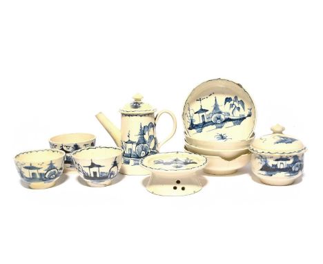 A miniature or toy creamware tea service, late 18th century, painted in blue with a pagoda landscape, some damages. Comprisin