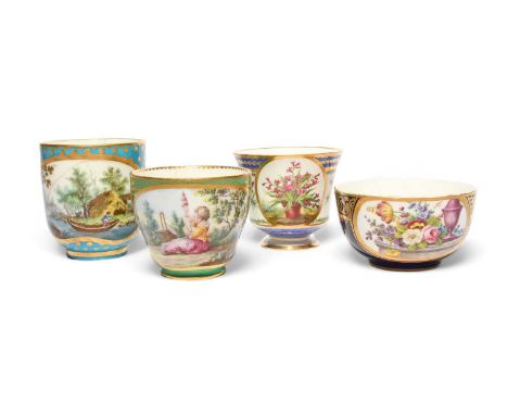 Four Sèvres cups, date codes for 1767 and 1791, one cup painted by Jean-Baptiste Tandart with flowers and an urn on a bleu ma