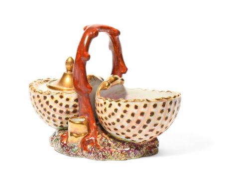 A Paris porcelain shell inkwell, 19th century, modelled as two deep scallop shells, one set with a small gilded inkwell and c