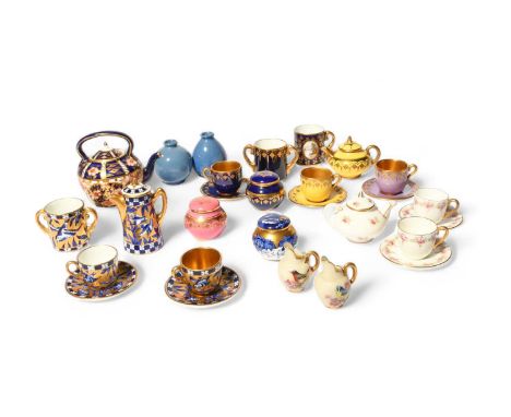 A large collection of English porcelain miniature teawares, late 19th/20th century, including a Coalport teapot and cup and s