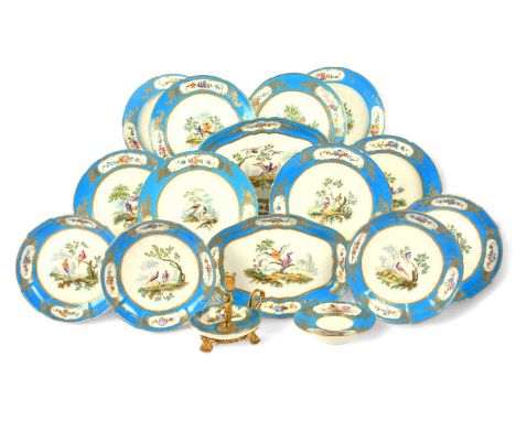 Four Sèvres-style circular dishes (compotiers rond) and eight plates, probably late 18th century, painted with colourful bird