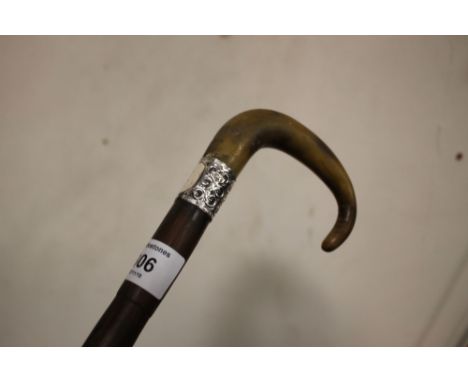 A SILVER MOUNTED HORN HANDLED WALKING STICK