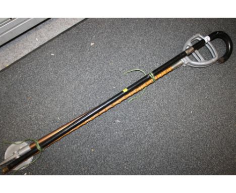 A SILVER COLLARED EBONISED WALKING STICK TOGETHER WITH A SWAGGER STICK AND A SHOOTING STICK