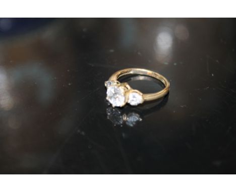 A 9CT GOLD THREE STONE CZ DRESS RING