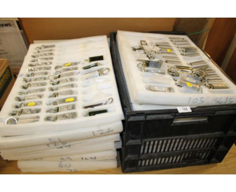 A LARGE QUANTITY OF NEW LIGHT UP NAME TAG KEY RINGS 