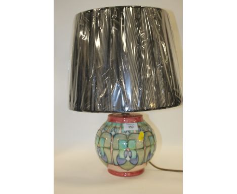 A VINTAGE MOORCROFT LAMP WITH SHADE