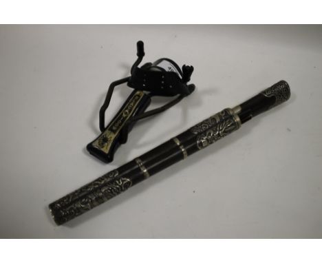 A BLACK WIDOW CATAPULT TOGETHER WITH AN ORIENTAL DAGGER AND CHOPSTICK SET