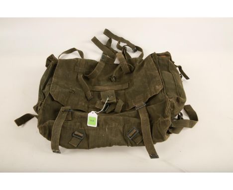 A collection of assorted webbing belts and other items to include a portable axe and cover#1459 