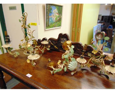 A PAINTED METAL THREE LIGHT CEILING LIGHT FITTING  with floral decoration, and a matching pair of two light wall lights