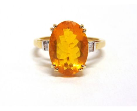 A FINE OPAL 9 CARAT GOLD RING  the oval cut with a trio of baguette diamonds to each shoulder, finger size O, 2.9g gross.