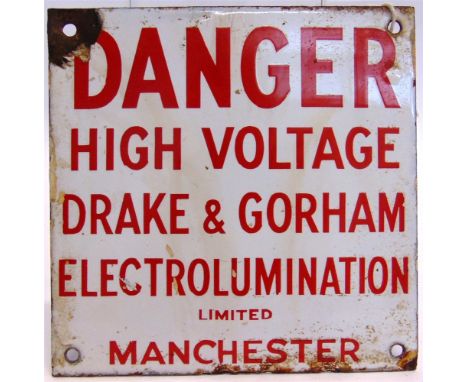 AN ENAMEL WARNING SIGN  'Danger / High Voltage / Drake & Gorham / Electrolumination / Limited / Manchester', with red letteri
