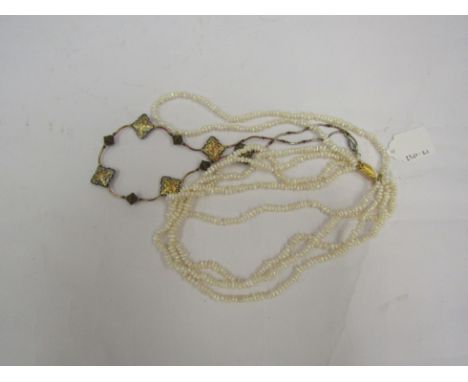 A five strand freshwater pearl necklace and an ornate Chinese enamel bead necklace