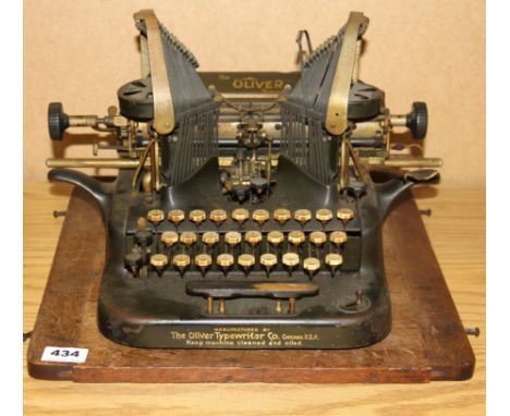 An early Oliver standard typewriter with three row keyboard.