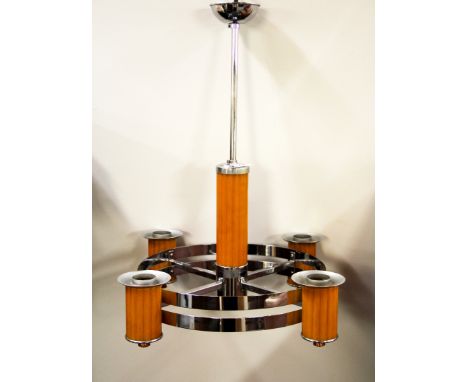 An Art Deco chrome and Bakelite four branch ceiling light fitting, H. 60cms, W.41cms.