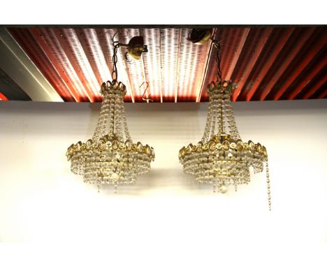 A pair of 1970's gilt metal chandelier light fittings, dia. 30cms.
