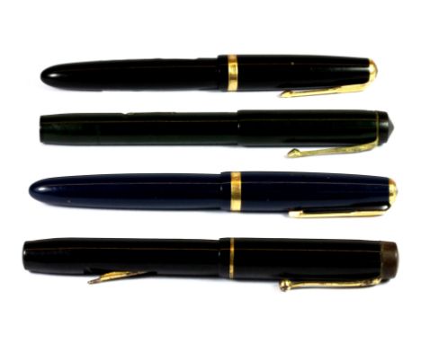 Four vintage fountain pens, all with 14ct gold nibs.