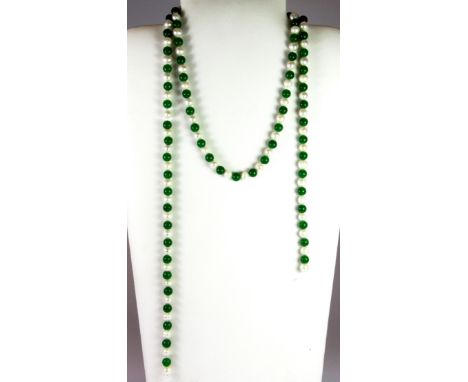 A large pearl and jade bead necklace, L. 57cm.