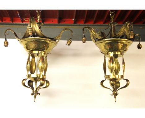 A pair of Art Nouveau style brass chandelier light fittings, D. 65cms.