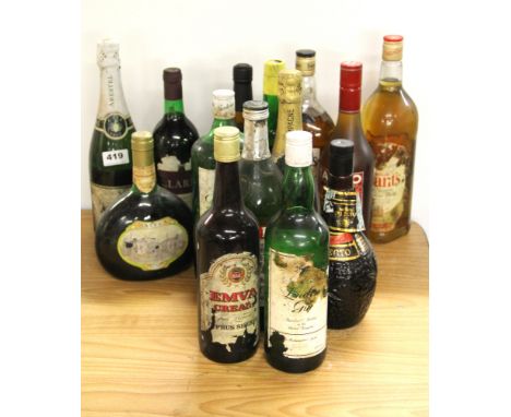 A quantity of vintage bottles of wines and spirits.