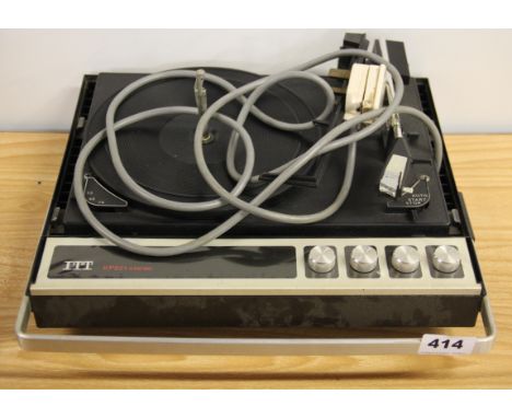 A 1960's portable record player with speakers forming the cover, by ITT.