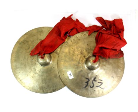 A pair of Tibetan Buddhist temple cymbals.