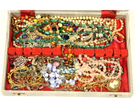 A case of mixed vintage glass and other beads.