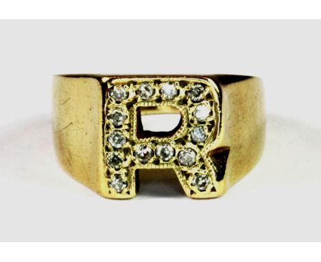 A 9ct yellow gold initial 'R' ring set with diamonds, (K).