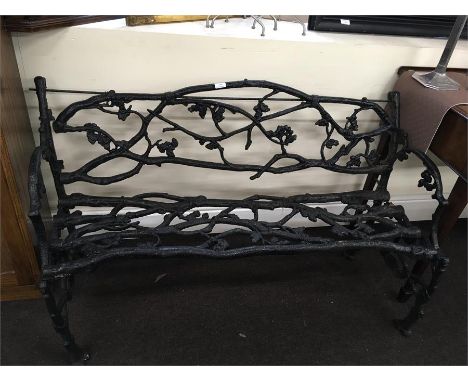 Cast iron garden bench, approx measurements: 52 inches length, height: 31 inches.