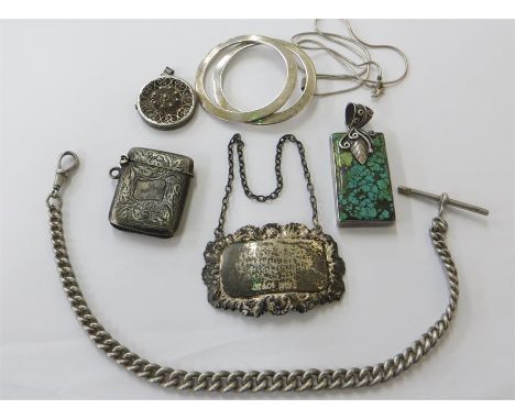 Selection of silver items to include silver albert chain silver vesta case wine label turquoise pendant etc total weight 127 