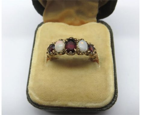 Vintage 9ct Gold garnet & opal dress ring weight 2.8 grams 