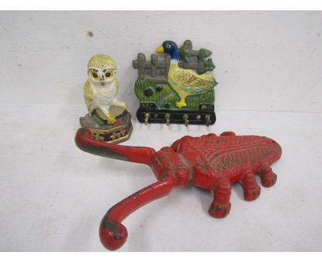 Cast grass hopper boot jack, owl door wedge and key rack