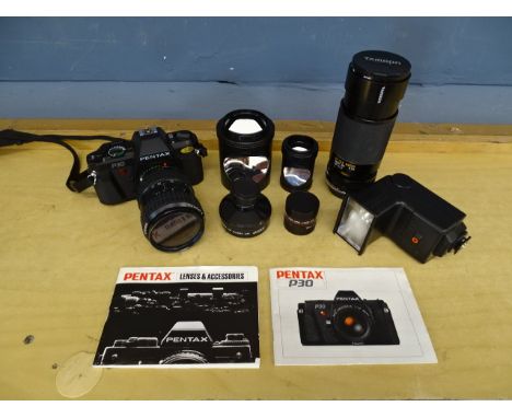 Pentax P30 film camera with Tamron and Takumar lenses, accessories and booklets etc&nbsp;