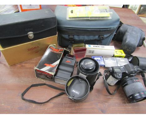 Minolta camera with accessories and Sigma lens&nbsp;&nbsp;