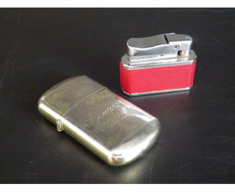 2 vintage lighters - 'Ronson Tempest' and a 'Dragon excellent automatic lighter'