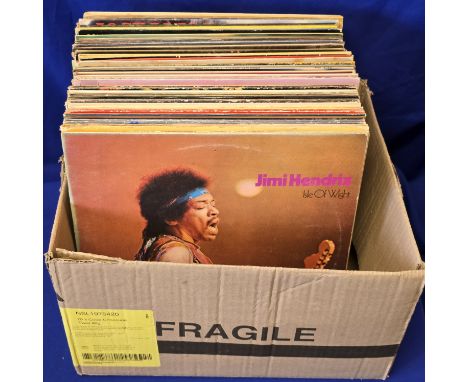 Box of vinyl records mixed genres Jimi Hendrix The beat etc