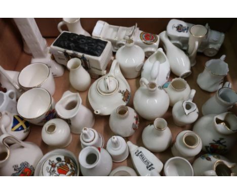 Carlton souvenir crested china model of a coal wagon, a Willow Art china model of an early automobile and a selection of othe