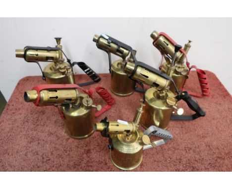 Six vintage brass blowlamps 