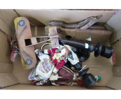 Pair of cast metal wall lights, two vintage wood working planes, a tin plate biplane, costume dolls etc 