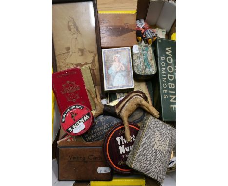 Box containing a selection of various tins including Wrens boot polish, Woodbine dominos, some dolls, playing cards etc 