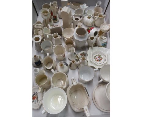 Approximately fifty pieces of souvenir crested china including a W H Goss candlestick, etc in one box