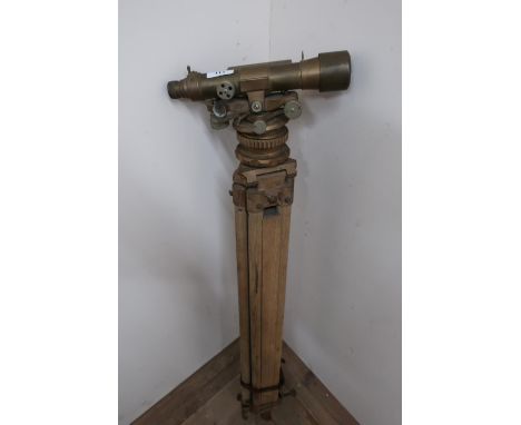 Surveyor's theodolite stamped AH Hall and Bros, London N1 58434, on oak tripod 