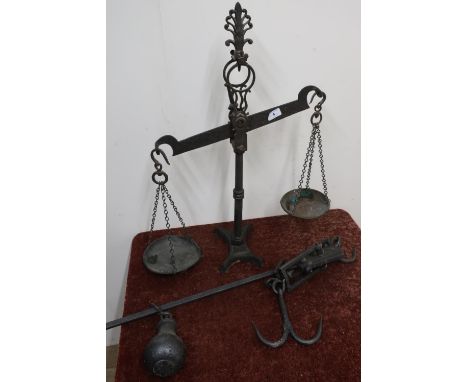 Pair of Victorian cast metal balance scales (lacking pans) and a butchers style hanging scales (2) 