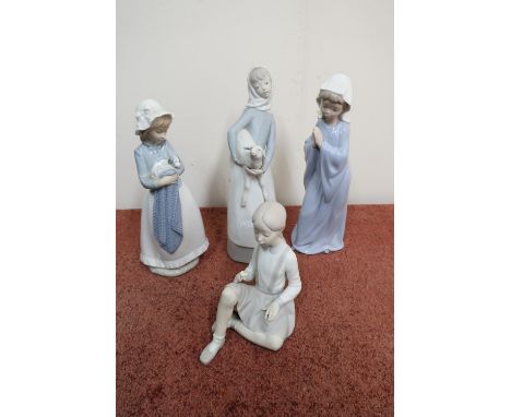 Two Lladro and two Nao figurines 