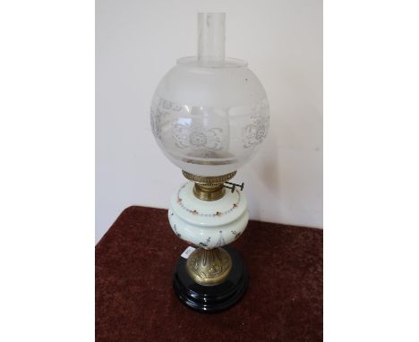 Edwardian oil lamp with opaque glass reservoir on turned circular base (55cm high) 
